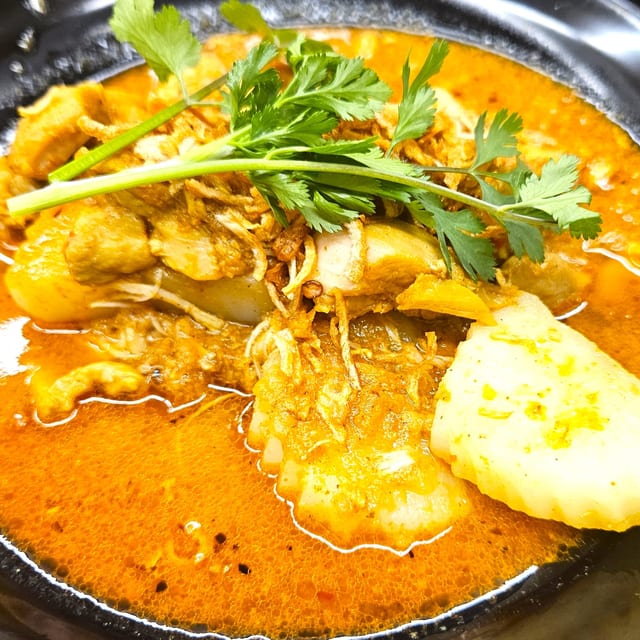 C10 Chicken marsala (Burmese-style).